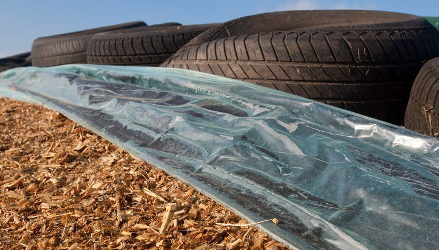 Silage framed by plastic and tires