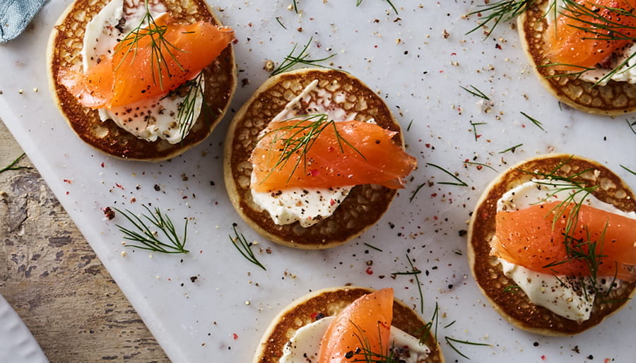 Smoked salmon on blinis with cream cheese