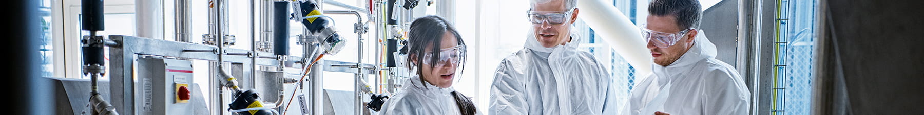three scientists in lab