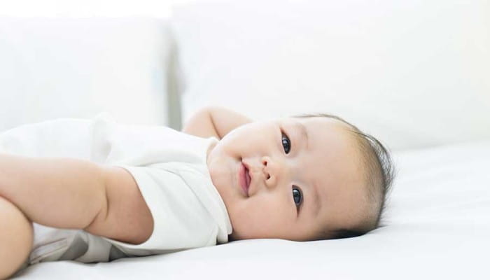 Asian baby looking into camera